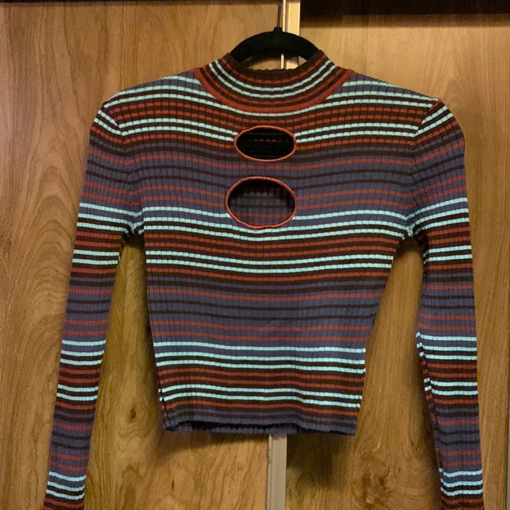 Long sleeve multicolor crop with two chest cut outs. Size M